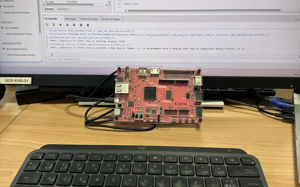 Pynq-Z2 board on the bench in front of a Vivado session